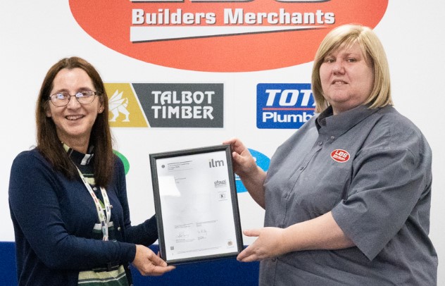 Sarah Colcombe (right), Stock Control Administrator, receiving her award from her line manager Amanda Reed, Head of Procurement.